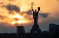 The Motherland Monument sunset swarm of birds Kiev