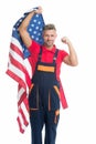 Motherland USA. Man cheerful laborer hold american flag. Repair and renovation. Repair tips. Guy worker in uniform Royalty Free Stock Photo