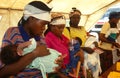 Mothers and babies at a mobile health clinic, Rwanda