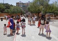 Mothers and children leaving school