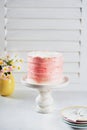 Mothers day, Birthday elegant ombre pink Cake on a white background banner with party decor. Copy space. Celebration Trendy bakery