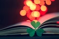 Mothers Day card: Heart shaped leaves and open book Royalty Free Stock Photo