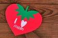 Mothers day card on wooden table. Children's crafts, greeting card I love mom. Paper strawberry. Original card Royalty Free Stock Photo