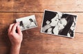 Mothers day composition. Black-and-white pictures, wooden background. Royalty Free Stock Photo