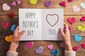 Mothers day composition, fabric hearts. Studio shot, wooden back Royalty Free Stock Photo