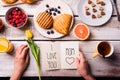 Mothers day composition. Greeting card and breakfast meal. Royalty Free Stock Photo