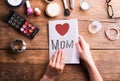 Mothers day composition. Greeting card and make up products. Royalty Free Stock Photo