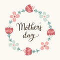 Mothers day greeting card, invitation. Handwritten brush script, lettering. Floral wreath. Stock