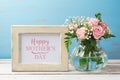 Mothers day greeting card with rose flower bouquet and photo frame Royalty Free Stock Photo