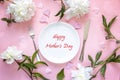 Mothers Day greeting message with table setting, white peonies a