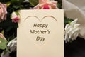Mothers day heart card with rustic roses on wooden board Royalty Free Stock Photo