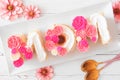 Mothers Day MOM cake with pink and white candy flowers Royalty Free Stock Photo