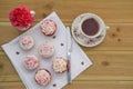 Mothers day words with homemade mini cakes and pink flower Royalty Free Stock Photo