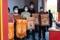 The Mothers holding the Chinese traditional tray in the line up