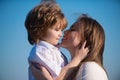 Mothers love. Closeup portrait of mother and child kissing. Mother hugging and embracing son. Mothers day, love family