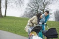 Mothers With Strollers In Park Royalty Free Stock Photo