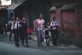 Mothers Take Her Children to School at Thamel Street