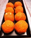 Motichoor-Ladoo dessert sweet-food Indian-food Indian-culture mithai snack hinduism plate sugar-food tradition orange-color