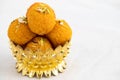 Motichur Laddu Also Called Motichoor Ladoo Decorated In Golden Dessert Bowl. Meetha Laddoo Is Served To God In Indian Festivals