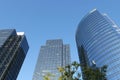 Motion of blue sky with illuminated reflected glass facade on modern office building Royalty Free Stock Photo