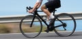 Motion blur of a bike race with the bicycle and rider at high speed Royalty Free Stock Photo