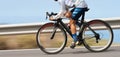 Motion blur of a bike race with the bicycle and rider at high speed Royalty Free Stock Photo