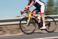 Motion blur of a bike race with the bicycle and rider at high speed Royalty Free Stock Photo