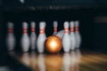 Motion blur of bowling ball and skittles on the playing field Royalty Free Stock Photo