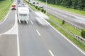 Motion blur of camper and cars passing on a highway in summer.