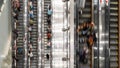 Motion blur of crowd Asian people transport on escalator at subway underground station in Hong Kong. Public transportation Royalty Free Stock Photo