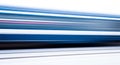 Motion Blur of a Fast- Moving Blue and White Train speed Royalty Free Stock Photo