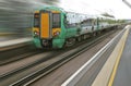 Motion blur from fast speeding english train Royalty Free Stock Photo