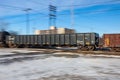 Motion Blur of Freight Train Crossing Tracks Royalty Free Stock Photo