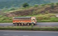 Motion blur image of a goods truck speeding on a highway. Royalty Free Stock Photo