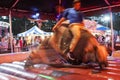 Motion Blur Of Man Riding Mechanical Bull At County Fair Royalty Free Stock Photo