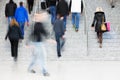 Motion Blur of People Walking on Stairs Royalty Free Stock Photo