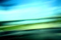 Motion blur shot with green, teal, yellow, and dark green gradient