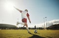 Motion blur, soccer field and man kick ball to player on stadium pitch in sports competition game to score goals Royalty Free Stock Photo