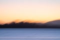Motion blur sunrise over bay Royalty Free Stock Photo
