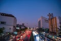 Motion blur of traffic on the road with building at wongwianyai Bangkok city Thailand