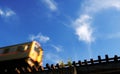 Motion blur train in the blue sky Royalty Free Stock Photo