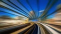 Motion blur of train moving inside tunnel in Odaiba, Tokyo Royalty Free Stock Photo