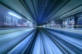 Motion blur of train moving inside tunnel in Tokyo, Japan Royalty Free Stock Photo