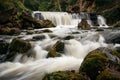 Waterfall in forest with cascade river in Belarus