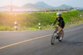 Motion blur woman riding bicycle Royalty Free Stock Photo