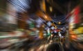 Motion blurred abstract lights of a nighttime street scene in Chinatown, New York City Royalty Free Stock Photo