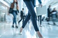 Motion blurred of business people move swiftly through an office lobby, the energetic flow of the corporate world Royalty Free Stock Photo