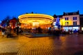 Motion blurred carousel at night in Waterford, Ireland