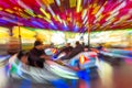 Motion Blurred Dodgems or Bumper Cars at a Fun Fair Royalty Free Stock Photo