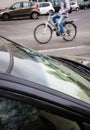 Motion blurred female biker on a city street Royalty Free Stock Photo